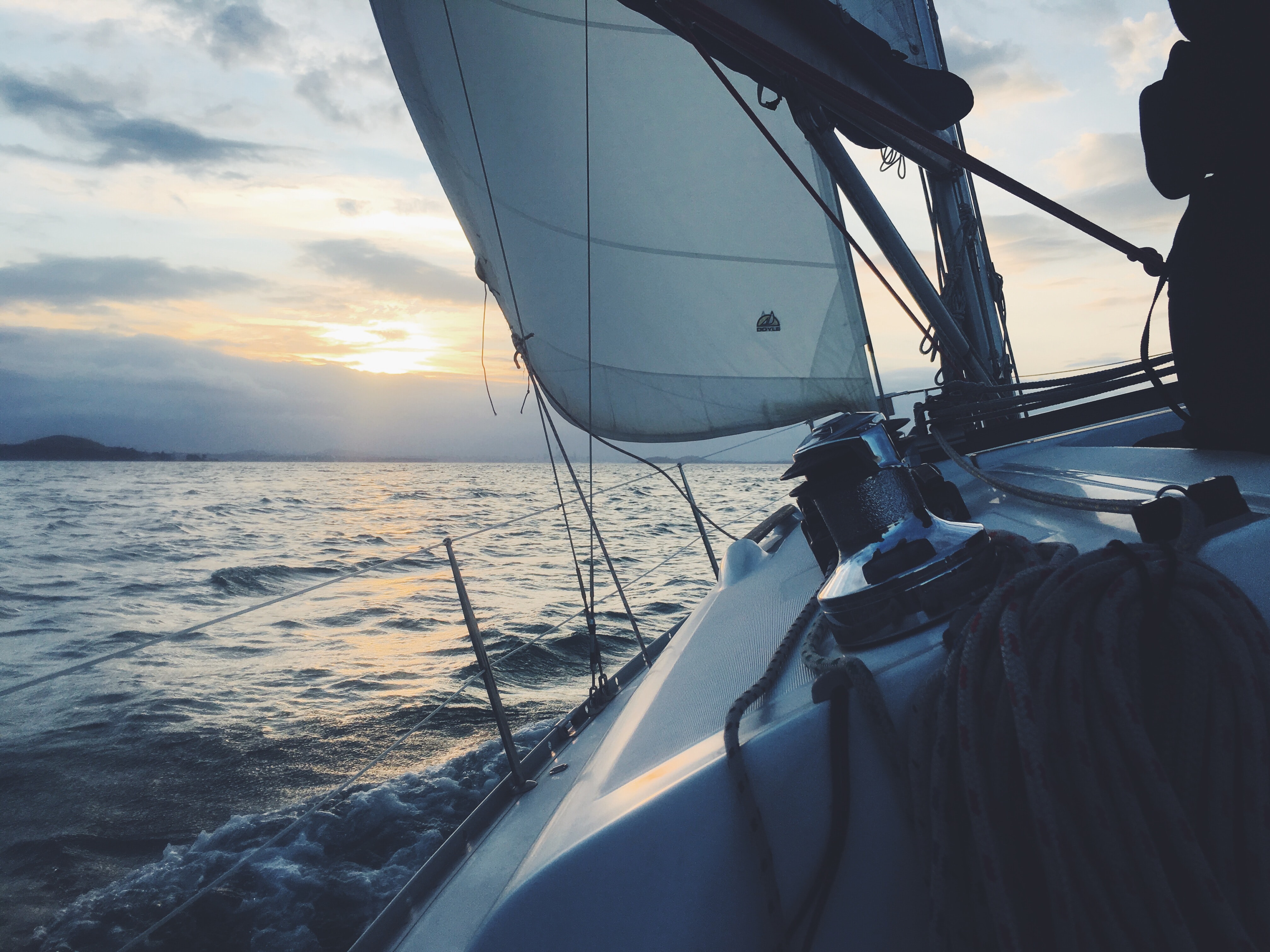 A sailing ship, on the ocean.